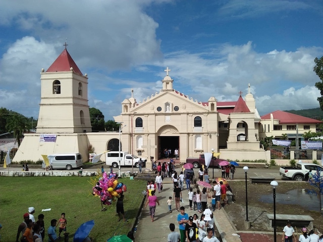 FIESTA ATMOSPHERE. People begin massing near the San Lorenzo de Martir Church in Balangiga, Eastern Samar, on December 15, 2018, in preparation for the official handover of the Balangiga Bells. Photo courtesy of Lady Camelot  