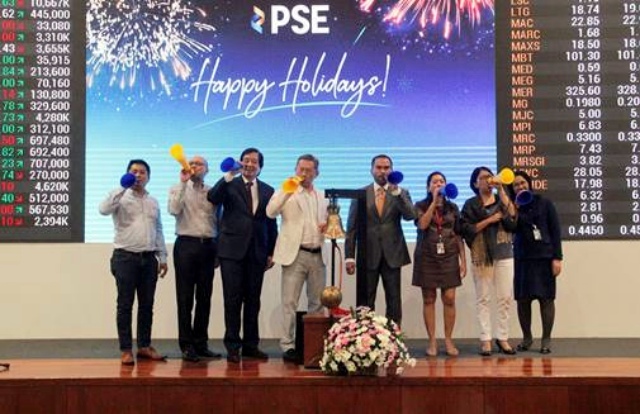 ALL-TIME HIGH. The executives of Philippine Stock Exchange on Friday, December 29 celebrate last trading day of 2017. Photo from PSE Corporate Communications  