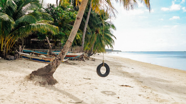 WHITE. One of the beaches in San Juan, Siquijor is picture perfect with its bone-white sand. Photo by Josh Berida 