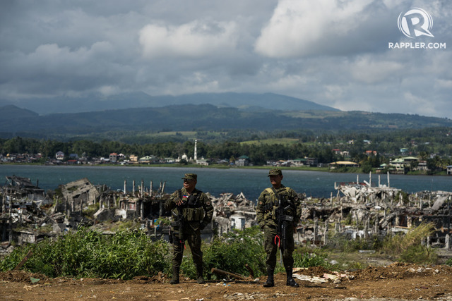 BLACK MEMORY. The devastation of Marawi City from a 5-month siege by terrorists highlights the urgency of addressing historical grievances among Muslims in Mindanao. Photo by Martin San Diego/Rappler 