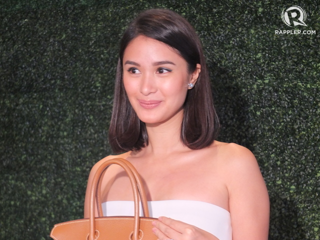 Check out Heart Evangelista's line of hand-painted bags