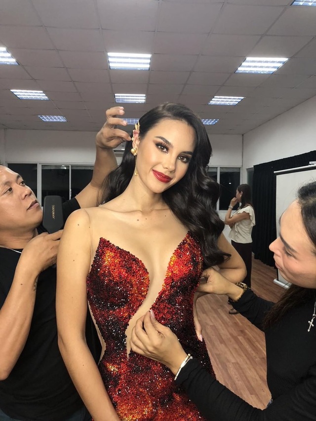 TRIAL. Brent and Justine makes adjustments on hair and Catriona's dress during a fitting session. 