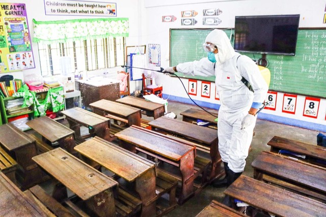 DISINFECTION. The Pasig city local government official disinfects schools and other public places in the city. Photo from the Pasig City Public Information Office 