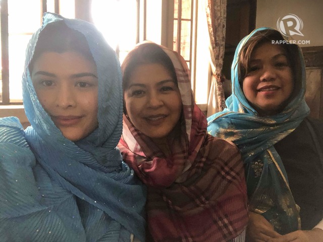 VEILED LADIES. From left to right: Mariel de leon, Sandy Andolong de Leon, and Angie Laborte wear veils to show respect. 