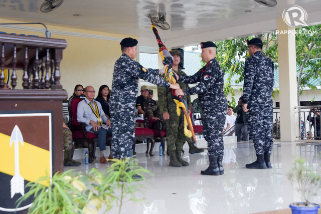 CHANGE OF COMMAND. Philippine Army chief Lieutenant General Rolando Bautista transfers the flag from Paje to Gonzales. 