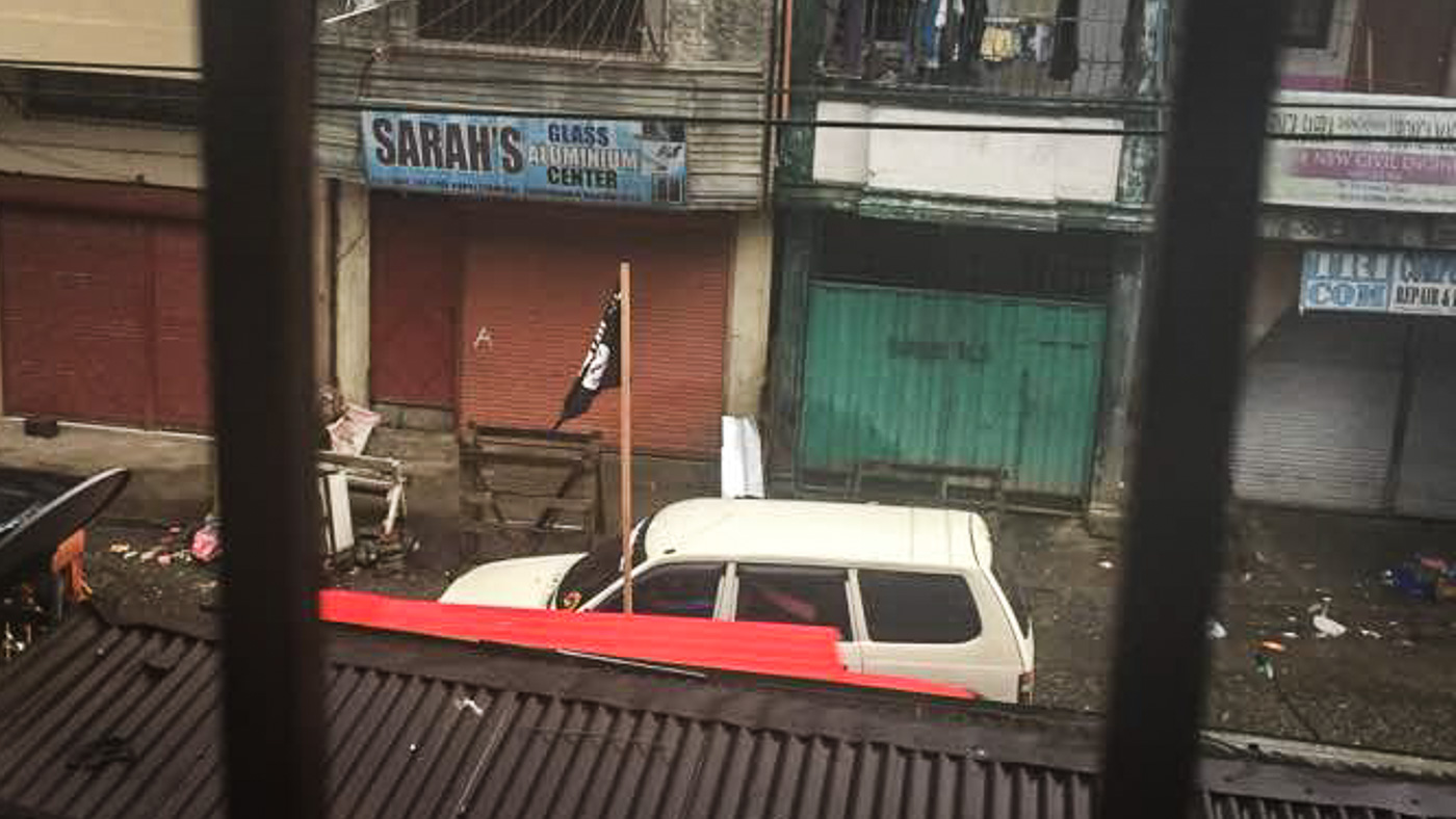 Image result for raising of ISIS flag in Marawi city