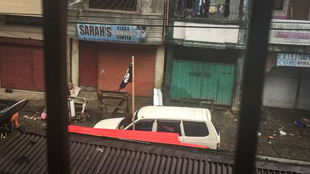BLACK FLAG. ISIS black flags are seen atop vehicles roaming the streets of Marawi City. Photo by Maulana Macadato     