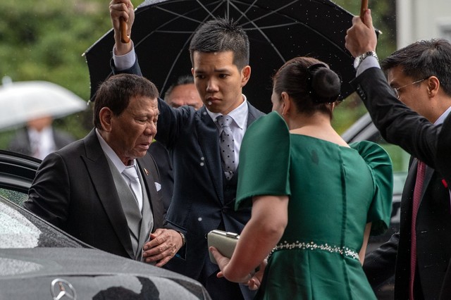 DUTERTE'S PAIN. Philippine President Rodrigo Duterte (L) arrives to attend the enthronement ceremony of Japan's Emperor Naruhito at the Imperial Palace in Tokyo on October 22, 2019. (Photo by Carl Court/AFP