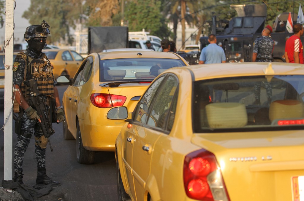 Calm returns to Iraq as U.S. condemns violence