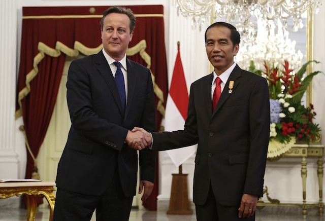 British PM visits Southeast Asia with trade, ISIS on agenda