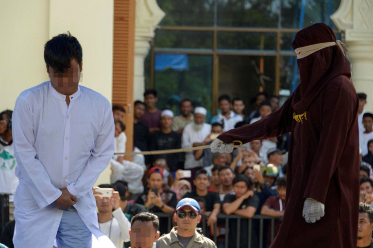 Indonesia S Aceh Whips Gay Couple For Sharia Banned Sex