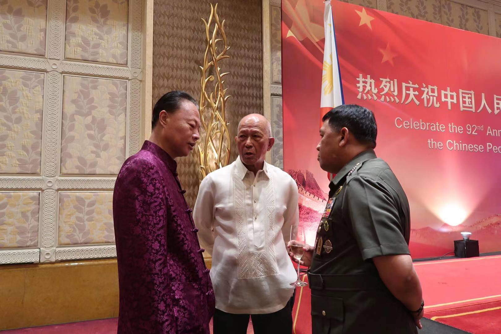 DEFENSE CHIEF. Defense Secretary Delfin Lorenzana (center) with Chinese Ambassador to the Philippines Zhao Jianhua (left). Photo from the Chinese embassy in Manila
