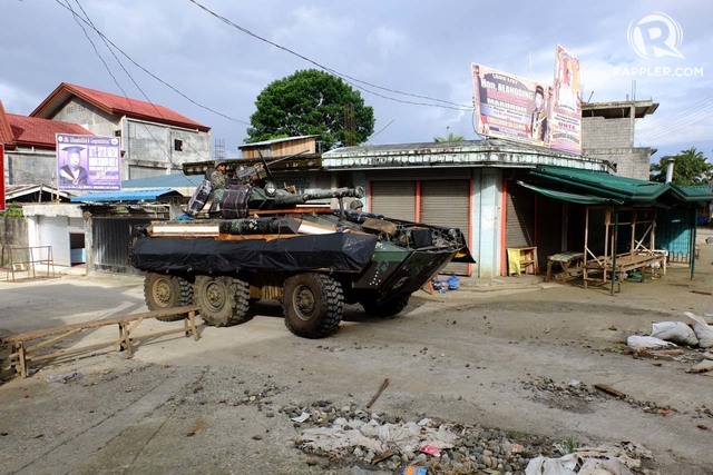 MARAWI CLASH. Using their V-300 Commando Fire Support Vehicle, the Philippine Marines patrol Barangay Saduc in Marawi City on June 6, 2017. Photo by Bbobby Lagsa/Rappler 