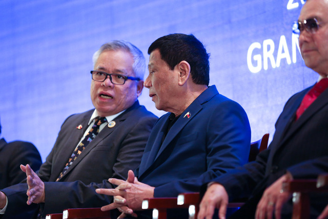 PHILIPPINE TRADE CHIEF AND DUTERTE. Trade Secretary Ramon Lopez (left) with President Rodrigo Duterte. Malacanang photo 
