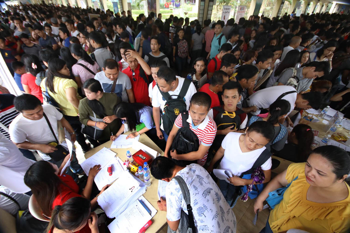 Thousands looking for work pack Labor Day job fairs